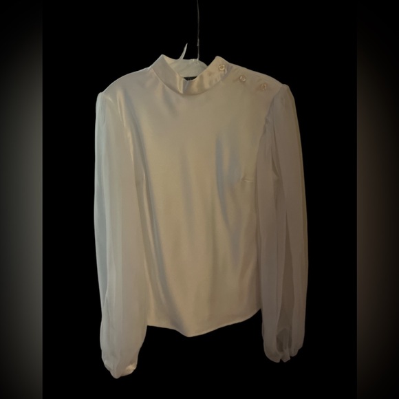 Beautiful sheen size small. Three button neck. Ballon style sleeves. - Picture 1 of 6